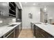 Well-equipped kitchen includes stainless steel appliances, quartz countertops, and ample storage space at 6619 E Lowry Blvd # 101, Denver, CO 80230
