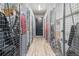 Well-lit storage area with individual caged units, ideal for organized storage at 6619 E Lowry Blvd # 101, Denver, CO 80230