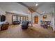 Cozy basement with plush seating, mountain views, and elegant wood trim at 1015 Nob Hill Rd, Evergreen, CO 80439