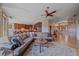 Open-concept living room connects to a gourmet kitchen, creating an ideal entertaining space at 1015 Nob Hill Rd, Evergreen, CO 80439