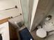 Cozy bathroom featuring a sink, toilet, and shower with an electric heater for added warmth at 11798 Sidney Rd, Golden, CO 80403