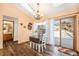 Charming dining area with a drop-leaf table and access to a patio at 810 Meadow Run, Golden, CO 80403