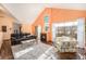 Bright and airy living room featuring hardwood floors and a fireplace at 810 Meadow Run, Golden, CO 80403