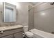 Bathroom featuring neutral walls, white toilet, and white shower and tub at 2648 Mayotte Way, Castle Rock, CO 80109