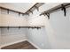 This closet offers shelving and metal bars to hang clothing at 2648 Mayotte Way, Castle Rock, CO 80109