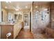 Spacious bathroom with double vanity and large shower at 1900 E Girard Pl # 608, Englewood, CO 80113