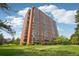 Exterior view of a brick high rise building at 1900 E Girard Pl # 608, Englewood, CO 80113