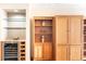 Built-in wine cooler and wooden shelving at 1900 E Girard Pl # 608, Englewood, CO 80113