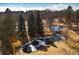 Aerial view of pond featuring small waterfall and ice formations at 1900 E Girard Pl # 608, Englewood, CO 80113