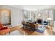 Bright living room with hardwood floors, fireplace, and modern decor at 3055 N Albion St, Denver, CO 80207