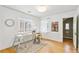 Cozy office nook features hardwood floors, natural light, and decorative wall art at 3055 N Albion St, Denver, CO 80207