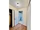 Bathroom and closet with brown carpet flooring, a sliding door shower and a toilet at 605 S Alton Way # 7A, Denver, CO 80247