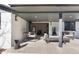 Modern patio with comfortable seating and access to the interior at 3888 S Jasmine St, Denver, CO 80237