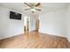 Spacious bedroom featuring hardwood floors and natural light at 11418 Macon St, Commerce City, CO 80640