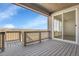 Balcony with scenic views overlooking a treed landscape at 9022 Spaulding St, Parker, CO 80134