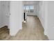 Bright entryway with durable plank flooring and ample natural light from large windows at 9022 Spaulding St, Parker, CO 80134