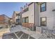 Exterior view showcasing the building's design, siding, and outdoor access at 11937 E Harvard Ave # 102, Aurora, CO 80014