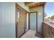 Covered patio with sliding glass door to interior at 11937 E Harvard Ave # 102, Aurora, CO 80014
