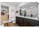 The bathroom has a double sink vanity with granite counters and a walk-in closet at 14836 Jersey Dr, Mead, CO 80542