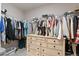 Walk-in closet with ample storage space and custom shelving at 14836 Jersey Dr, Mead, CO 80542