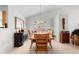 Formal dining room with vaulted ceilings and adjacent to the living room at 4023 E Geddes Cir, Centennial, CO 80122