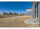 Spacious backyard featuring a fence, new landscaping, and a view of neighboring homes at 17467 E 89Th Way, Commerce City, CO 80022