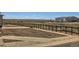 Open backyard with a fence line, new landscaping, and a view of the plains and neighboring homes at 17467 E 89Th Way, Commerce City, CO 80022