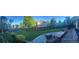 Manicured backyard featuring a patio with outdoor seating and a lush green lawn at 9445 Aspen Hill Cir, Lone Tree, CO 80124
