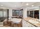 Bright bathroom featuring a soaking tub, tiled backsplash, and walk-in glass shower at 9445 Aspen Hill Cir, Lone Tree, CO 80124