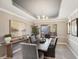 Formal dining room with elegant lighting and a sleek table creating the perfect ambiance at 9445 Aspen Hill Cir, Lone Tree, CO 80124