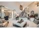 Inviting living room with a staircase and comfortable seating, perfect for relaxing at 9445 Aspen Hill Cir, Lone Tree, CO 80124