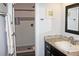 A modern bathroom with a shower and a single sink at 95 S Eagle Cir, Aurora, CO 80012