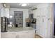 Modern kitchen boasting granite countertops, stainless steel appliances, and ample cabinet space at 95 S Eagle Cir, Aurora, CO 80012