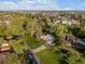 Aerial view of a neighborhood with mature landscaping surrounding unique homes at 11900 W 18Th Ave, Lakewood, CO 80215