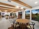 Upstairs dining room with open floor plan and an abundance of natural light at 11900 W 18Th Ave, Lakewood, CO 80215