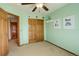 Freshly painted bedroom with neutral carpet and closet space for storage at 1909 Alpine Dr, Erie, CO 80516