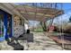 Covered backyard patio for outdoor entertaining at 1720 Pecos Way, Denver, CO 80221