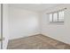 Neutral bedroom with window and carpet floor at 1720 Pecos Way, Denver, CO 80221