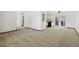 Spacious living area with neutral carpet at 1720 Pecos Way, Denver, CO 80221