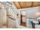Nicely decorated bathroom showcasing wood and stone finishes, stone floors, a walk in shower and dual sinks at 1928 S Washington St, Denver, CO 80210