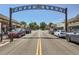Street view of South Pearl Street with shops and parked cars on both sides of the road at 1928 S Washington St, Denver, CO 80210