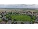 A birds-eye shot of the community showcases a large park, neighborhood streets and residences at 9758 Laredo St # 22D, Commerce City, CO 80022