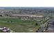 Aerial view of the school showing its playground and sports facilities at 9758 Laredo St # 22D, Commerce City, CO 80022