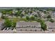 An elevated community view features manicured lawns, tree-lined streets, and diverse housing options at 9758 Laredo St # 22D, Commerce City, CO 80022