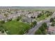 Desirable neighborhood aerial displaying lush green spaces and well-kept residences at 9758 Laredo St # 22D, Commerce City, CO 80022