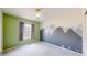 Bright bedroom featuring a lovely gray mountain mural at 9758 Laredo St # 22D, Commerce City, CO 80022