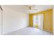 Bright bedroom featuring a yellow accent wall at 9758 Laredo St # 22D, Commerce City, CO 80022