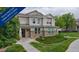 Charming two-story home with manicured lawn, stone accents and a welcoming front porch at 9758 Laredo St # 22D, Commerce City, CO 80022
