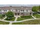 Well-manicured lawns and charming exteriors define these lovely townhomes at 9758 Laredo St # 22D, Commerce City, CO 80022