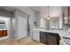 Updated kitchen featuring stainless steel appliances, light countertops and stylish tile backsplash at 9758 Laredo St # 22D, Commerce City, CO 80022